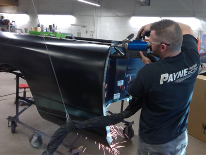 Body shop employee working